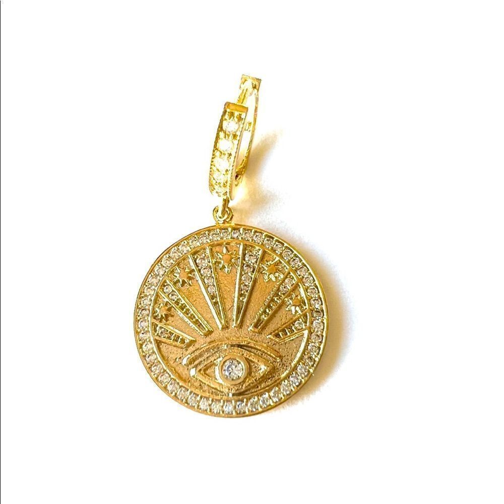 Gold huggie hoops with celestial sun and star coin charm earrings for women